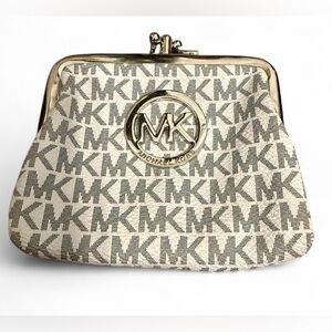 Michael Kors signature white and gray with a clasp closure